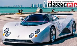 Silberner Lotec C1000 Supersportwagen mit markantem Heckspoiler und futuristischem Design, bereit für die Rennstrecke.